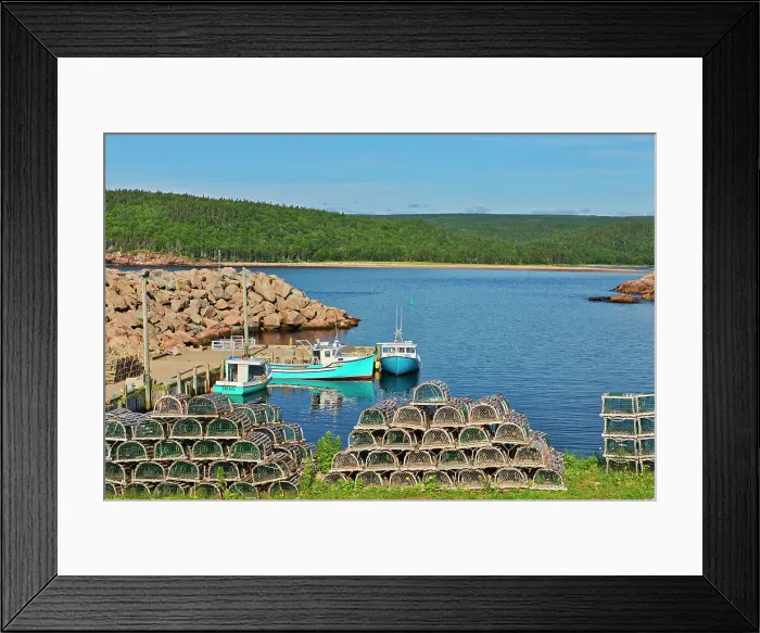 Framed Print : Fishing boats in coastal village. Cabot Trail. Cape Breton Island. Neils Harbour, Nova Scotia, Canada