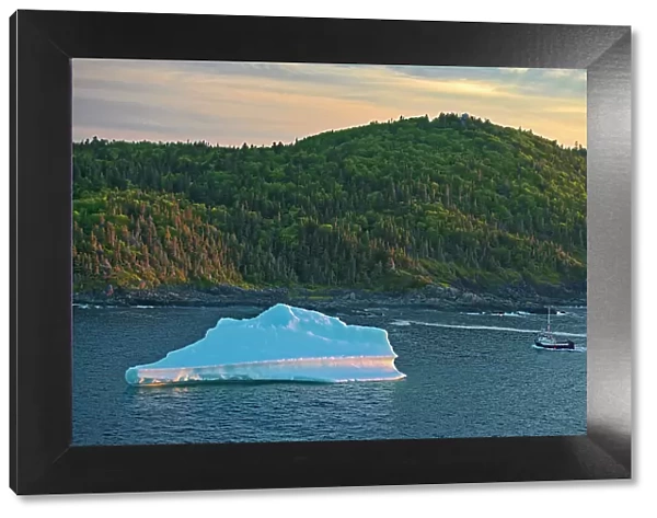 Iceberg in La Scie Harbour off the Atlantic Ocean. Baie Verte Peninsula. La Scie, Newfoundland & Labrador, Canada