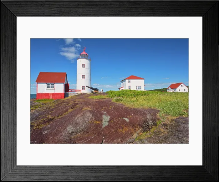 Framed Print : Ligthouse on the shore of the St. Lawrence River. Bas St. Laurent Region. Ile Verte lighthouse is the oldest on the St. Lawrence L'Isle-Verte, Quebec, Canada Framed Print : Ligthouse on the shore of the St. Lawrence River. Bas St. Laurent Region. Ile Verte lighthouse is the oldest on the St. Lawrence L'Isle-Verte, Quebec, Canada