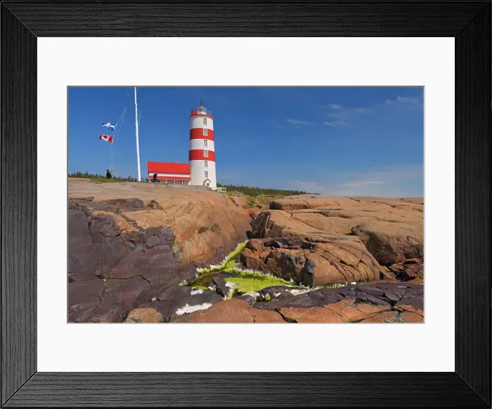 Framed Print : Pointe-des-Monts lighthouse along the North Shore of the Gulf of St. Lawrence Pointe-des-Monts, Quebec, Canada Framed Print : Pointe-des-Monts lighthouse along the North Shore of the Gulf of St. Lawrence Pointe-des-Monts, Quebec, Canada