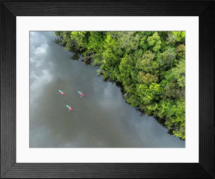 Framed Print : Asia, Cambodia, Cardamom Mountains, Botum Sakor National Park. Aerial shot of kayaks on the Preak Tachan river near Cardamom Tented Camp ecolodge