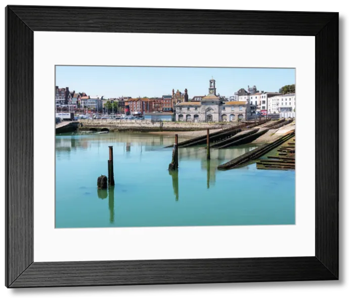 Framed Print : View towards Maritime Museum, situated in the Clock House on the quayside of the Royal Harbour of Ramsgate, Kent, England Framed Print : View towards Maritime Museum, situated in the Clock House on the quayside of the Royal Harbour of Ramsgate, Kent, England