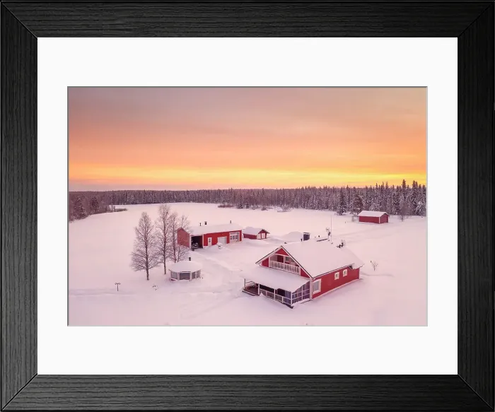 Framed Print : Europe, Finland, aerial view of a group of red buidlings on a frozen lake with the sun rising near Rovaniemi Framed Print : Europe, Finland, aerial view of a group of red buidlings on a frozen lake with the sun rising near Rovaniemi