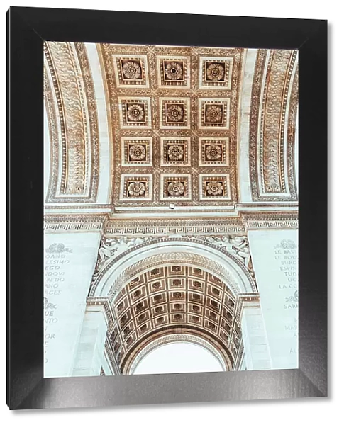 Under the Arc de Triomphe in Paris, France