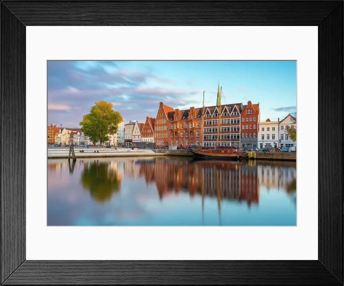 Framed Print : Houses on riverside of Trave river and Wassertreppe (Water steps) at sunset, Lubeck, UNESCO, Schleswig-Holstein, Germany Framed Print : Houses on riverside of Trave river and Wassertreppe (Water steps) at sunset, Lubeck, UNESCO, Schleswig-Holstein, Germany