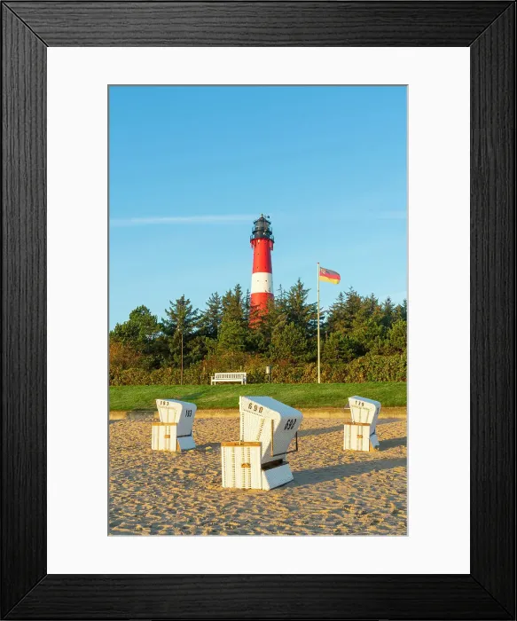 Framed Print : Beach chairs near German flag and Hornum lighthouse in background at sunrise, Hornum beach, Sylt, Nordfriesland, Schleswig-Holstein, Germany Framed Print : Beach chairs near German flag and Hornum lighthouse in background at sunrise, Hornum beach, Sylt, Nordfriesland, Schleswig-Holstein, Germany