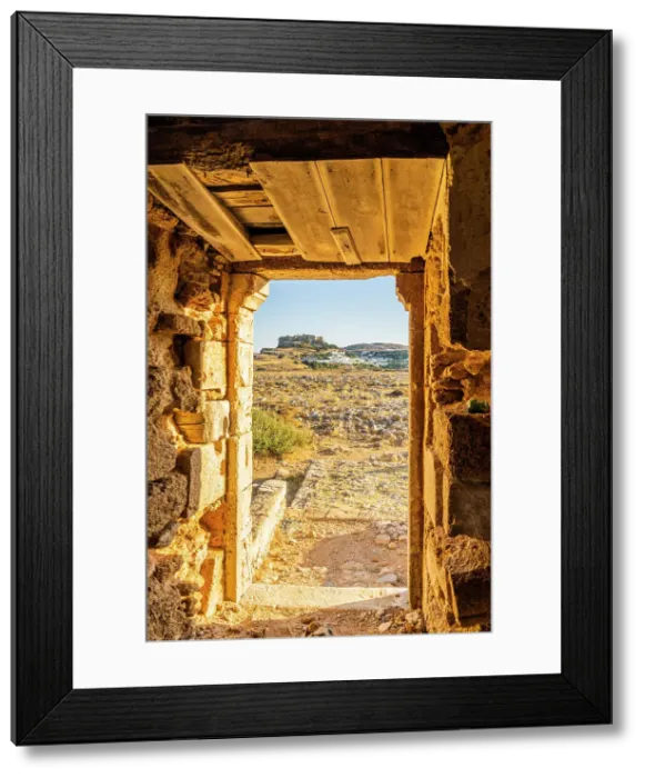 Framed Print : A view of the Acropolis of Lindos through an old windmill, Lindos, Rhodes, Dodecanese Islands, Greece Framed Print : A view of the Acropolis of Lindos through an old windmill, Lindos, Rhodes, Dodecanese Islands, Greece