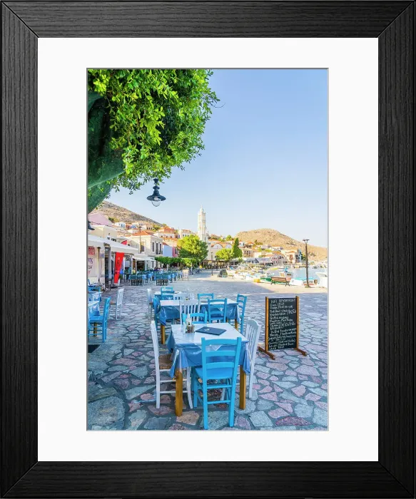 Framed Print : The colourful harbour and Saint Nicholas church in the background, Halki, Chalki, Dodecanese Islands, Greece Framed Print : The colourful harbour and Saint Nicholas church in the background, Halki, Chalki, Dodecanese Islands, Greece