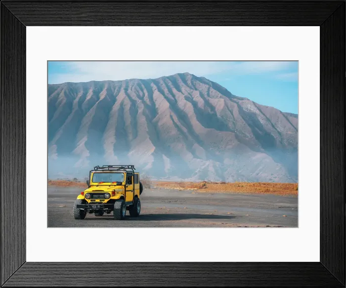 Framed Print : Bromo, 4x4 veichle on the sea of sand, Tenegger caldera on background. East Java, Indonesia Framed Print : Bromo, 4x4 veichle on the sea of sand, Tenegger caldera on background. East Java, Indonesia