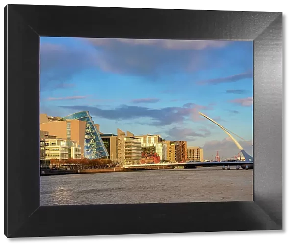 View over River Liffey towards Samuel Beckett Bridge and The Convention Centre at sunset, Dublin, Ireland