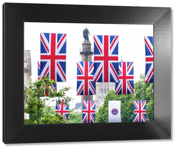 Union Jack flags and Duke of York monument, London, England