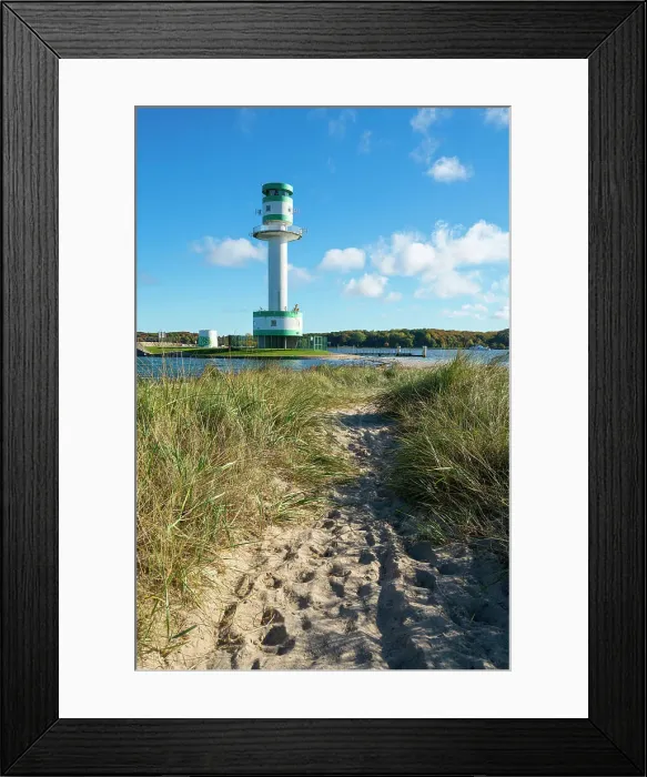 Framed Print : Footpath amidst grass against Friedrichsort lighthouse, Kiel, Schleswig-Holstein, Germany