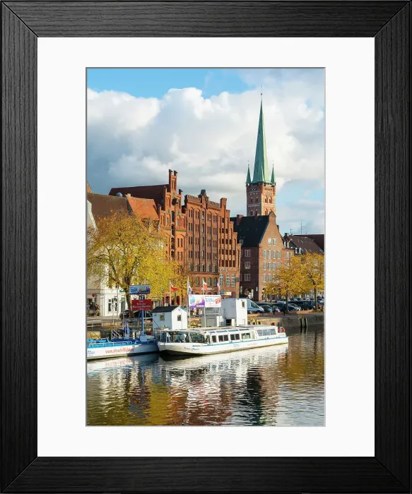 Framed Print : Boats on Trave river, traditional houses and St Petri Lubeck Church in background, Lubeck, UNESCO, Schleswig-Holstein, Germany Framed Print : Boats on Trave river, traditional houses and St Petri Lubeck Church in background, Lubeck, UNESCO, Schleswig-Holstein, Germany