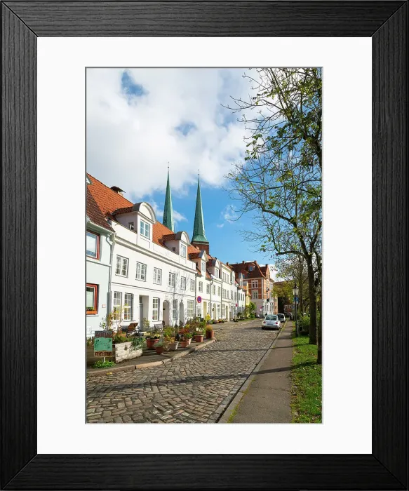 Framed Print : Residential buildings by Trave river with towers of Lubeck Cathedral in background, Lubeck, UNESCO, Schleswig-Holstein, Germany Framed Print : Residential buildings by Trave river with towers of Lubeck Cathedral in background, Lubeck, UNESCO, Schleswig-Holstein, Germany