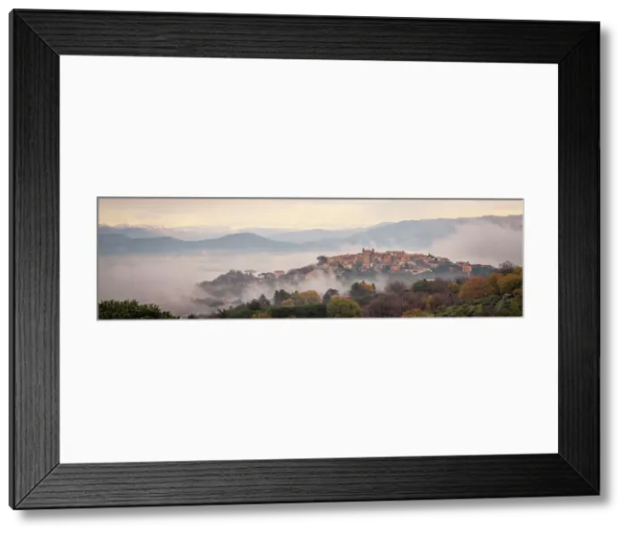 Framed Print : Europe, Italy, Latium. On a hiking path from Frascati watching the town of Monte Porzio Catone in the mist Framed Print : Europe, Italy, Latium. On a hiking path from Frascati watching the town of Monte Porzio Catone in the mist
