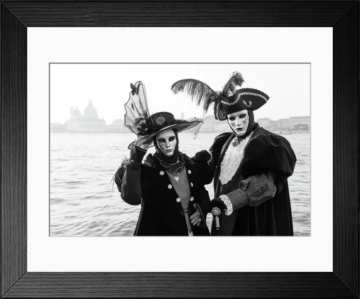 Framed Print : Italy, Veneto, Venice, a black and white version of a couple in costume in front of Salute during the Venice Carnival Framed Print : Italy, Veneto, Venice, a black and white version of a couple in costume in front of Salute during the Venice Carnival