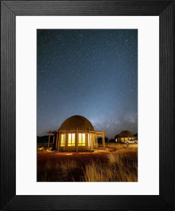 Framed Print : Namibia, illuminated rooms under the milky way in a game reserve safari lodge in Namib Naukluft National Park