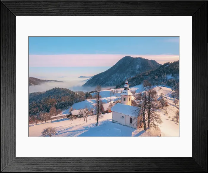 Framed Print : Aerial view of St Thomas Church and the Kamnik Alps, Rantovse, Slovenia at sunset Framed Print : Aerial view of St Thomas Church and the Kamnik Alps, Rantovse, Slovenia at sunset