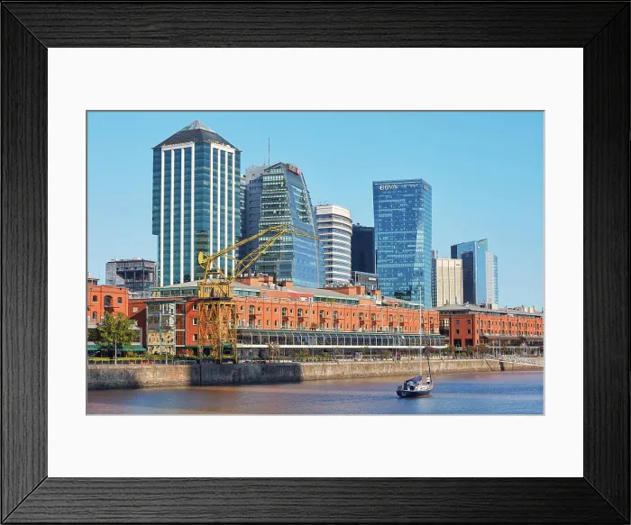 Framed Print : A sailboat in the Puerto Madero docks with the Buenos Aires skyscrapers in the background, Argentina Framed Print : A sailboat in the Puerto Madero docks with the Buenos Aires skyscrapers in the background, Argentina