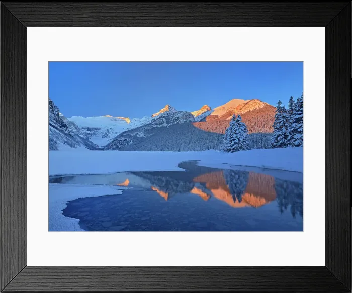 Framed Print : The Canadian Rocky Mountains reflected in Lake Louise at sunrise. Victoria Glacier on Mt. Victoria at left. Then from left to right is Mt. Whyte, The Big Beehive and Mt. Niblock and Mt. St. Piran. Banff National Park, Alberta, Canada Framed Print : The Canadian Rocky Mountains reflected in Lake Louise at sunrise. Victoria Glacier on Mt. Victoria at left. Then from left to right is Mt. Whyte, The Big Beehive and Mt. Niblock and Mt. St. Piran. Banff National Park, Alberta, Canada