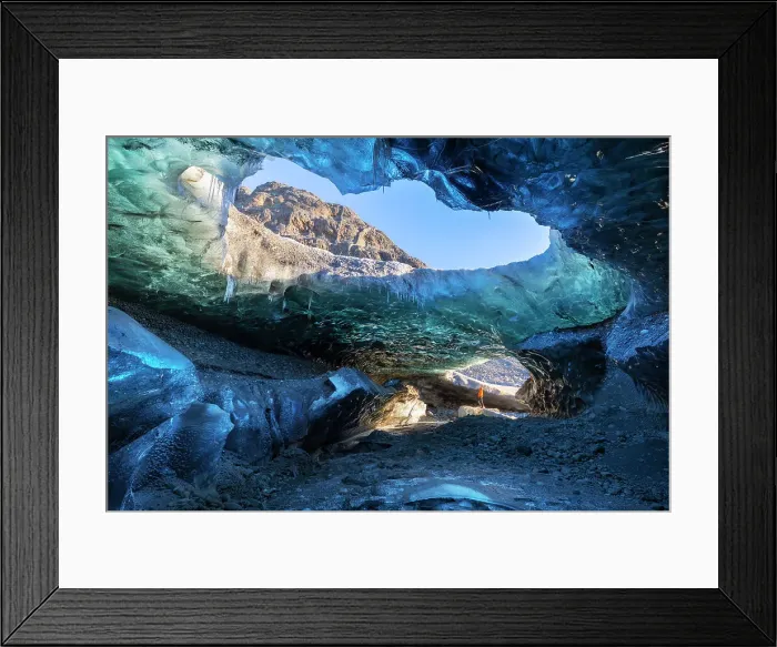 Framed Print : Man in an ice cave of Breidamerkurjokull, Austurland, Iceland Framed Print : Man in an ice cave of Breidamerkurjokull, Austurland, Iceland
