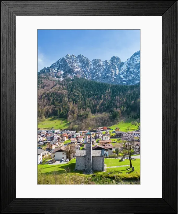 Framed Print : Aerial view of the small church called Cesuli in Colere town with view of the north face of the Presolana mountain in spring. Colere, Val di Scalve, Bergamo district, Lombardy, Italy, Southern Europe Framed Print : Aerial view of the small church called Cesuli in Colere town with view of the north face of the Presolana mountain in spring. Colere, Val di Scalve, Bergamo district, Lombardy, Italy, Southern Europe