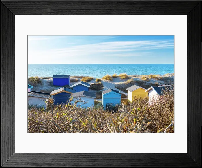 Framed Print : Scenic view of colourful beach huts against blue sky on the beach of Tisvildeleje, Tisvilde, Hovedstaden, Denmark Framed Print : Scenic view of colourful beach huts against blue sky on the beach of Tisvildeleje, Tisvilde, Hovedstaden, Denmark