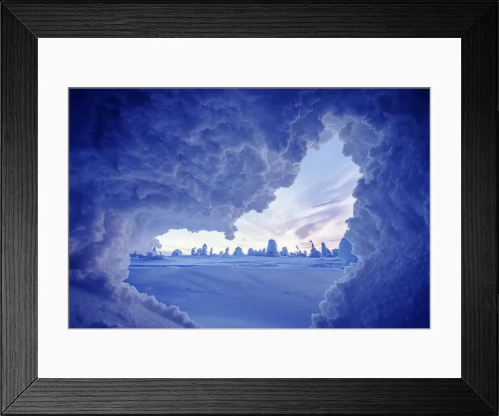 Framed Print : Winter scenery at dusk view from opening of an ice cave in shape of a heart, Riisitunturi National Park, Posio, Lapland, Finland Framed Print : Winter scenery at dusk view from opening of an ice cave in shape of a heart, Riisitunturi National Park, Posio, Lapland, Finland