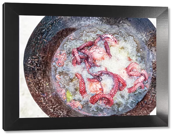 Dish with cooked octopus, Zanzibar, Tanzania