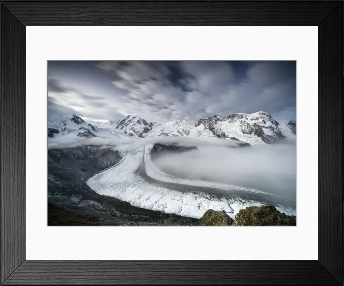 Framed Print : Mist over Monte Rosa glacier and snowy mountains under scenic clouds at dusk, Gornergrat, Zermatt, Valais, Switzerland Framed Print : Mist over Monte Rosa glacier and snowy mountains under scenic clouds at dusk, Gornergrat, Zermatt, Valais, Switzerland