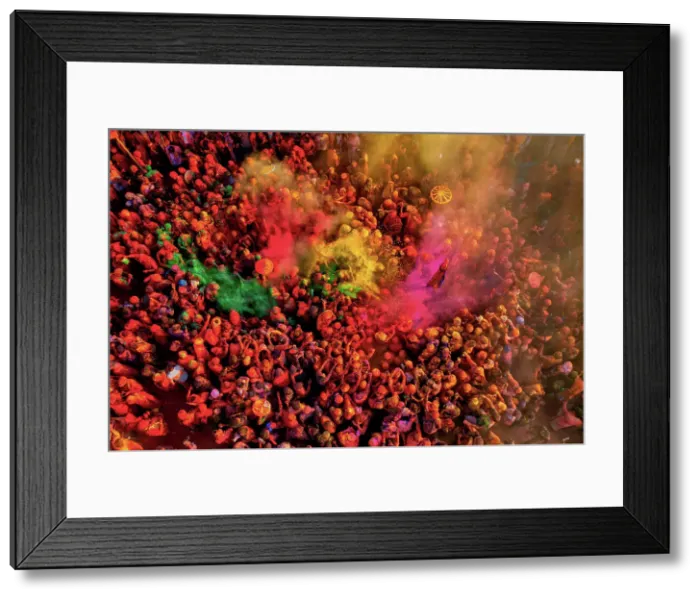 Framed Print : Aerial view of people celebrating the holy colour festival at Shri And Baba Temple, Nandgaon, Uttar Pradesh, India Framed Print : Aerial view of people celebrating the holy colour festival at Shri And Baba Temple, Nandgaon, Uttar Pradesh, India