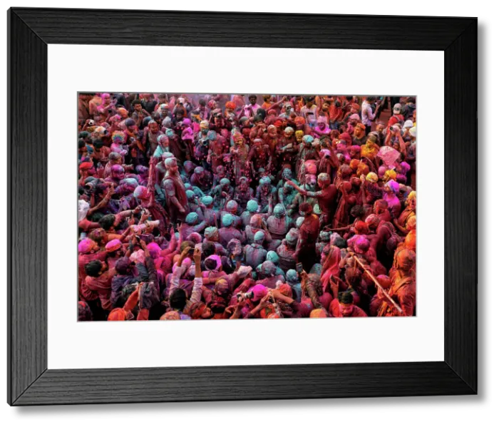 Framed Print : Aerial view of people celebrating the holy colour festival at Shri And Baba Temple, Nandgaon, Uttar Pradesh, India Framed Print : Aerial view of people celebrating the holy colour festival at Shri And Baba Temple, Nandgaon, Uttar Pradesh, India