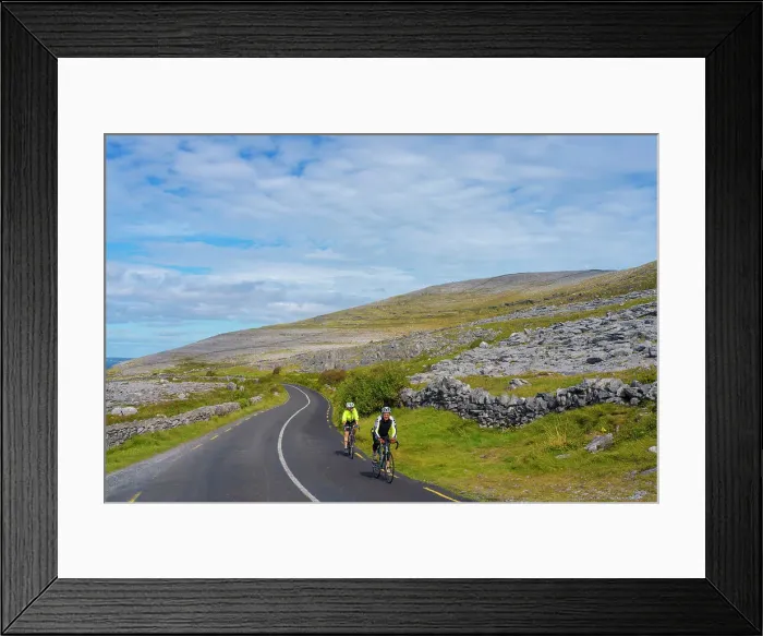Framed Print : Ireland, Co. Clare, The Burren, Ballyvaughan, cyclists on winding road Framed Print : Ireland, Co. Clare, The Burren, Ballyvaughan, cyclists on winding road
