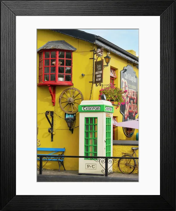 Framed Print : Ireland, County Clare, Bunratty, traditional telefone box at Durty Nellys bar and restaurant