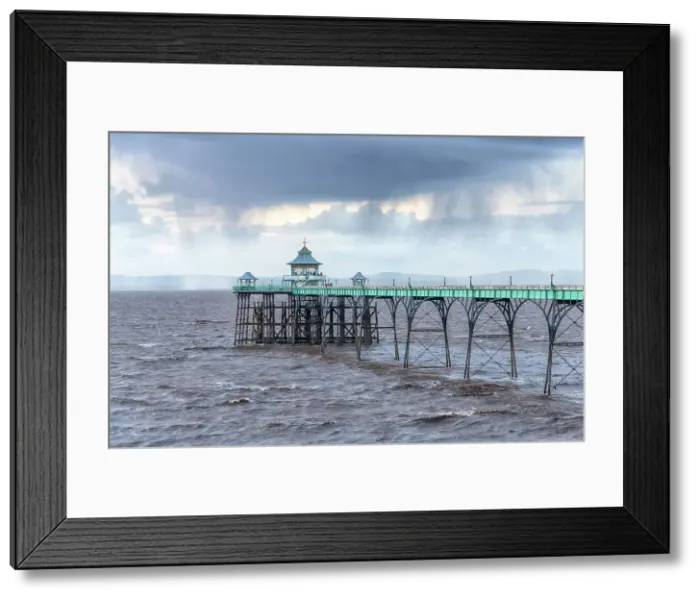 Framed Print : Clevedon Pier, opened in 1869 and one of the earliest surviving examples of a Victorian pier, Clevedon, Somerset, England Framed Print : Clevedon Pier, opened in 1869 and one of the earliest surviving examples of a Victorian pier, Clevedon, Somerset, England