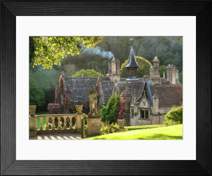 Framed Print : Evening light on The Manor House, 14th century building set in 365 acres of secluded parkland in the Cotswold village Castle Combe, Wiltshire, Cotswolds, England Framed Print : Evening light on The Manor House, 14th century building set in 365 acres of secluded parkland in the Cotswold village Castle Combe, Wiltshire, Cotswolds, England
