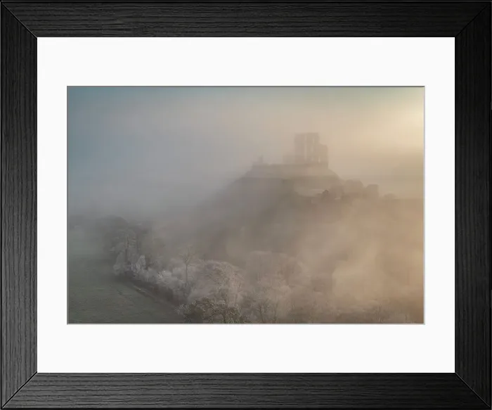 Framed Print : Corfe Castle emerging from mist on a frosty wintry morning, Dorset, England. Winter (February) 2023 Framed Print : Corfe Castle emerging from mist on a frosty wintry morning, Dorset, England. Winter (February) 2023