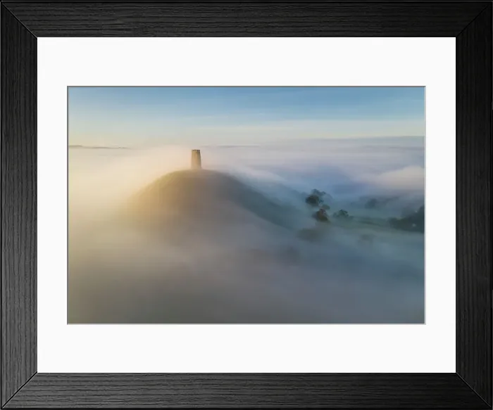 Framed Print : Aerial view of Glastonbury Tor shrouded in morning mist, Glastonbury, Somerset, England. Autumn (November) 2022 Framed Print : Aerial view of Glastonbury Tor shrouded in morning mist, Glastonbury, Somerset, England. Autumn (November) 2022