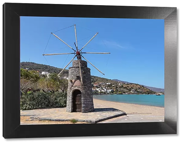 Windmill at the beach of Elounda, Mirabello Gulf, Lasithi, Crete, Greece