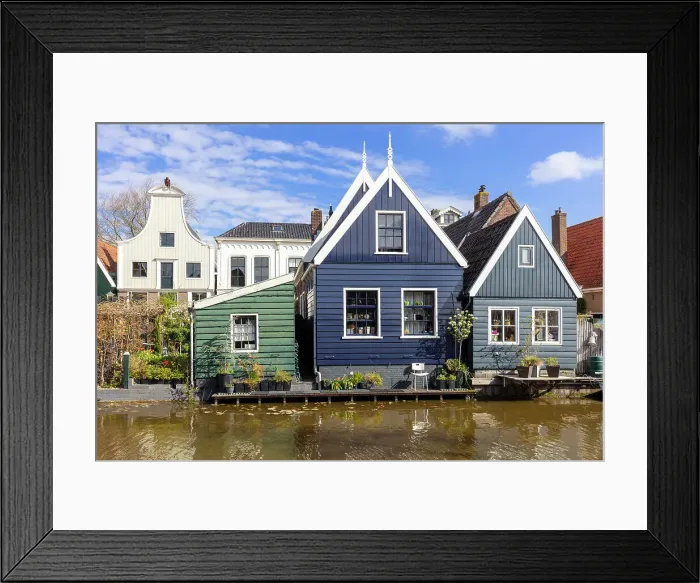 Framed Print : Colourful houses line the canal in the village of De Rijp, North Holland, Netherlands Framed Print : Colourful houses line the canal in the village of De Rijp, North Holland, Netherlands