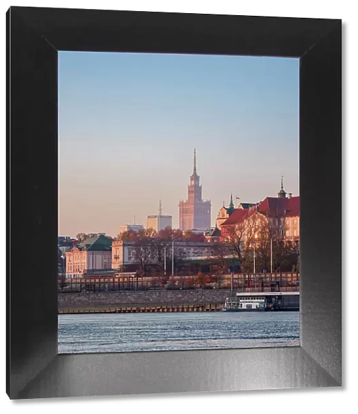 View over River Vistula towards Palace of Culture and Science at sunrise, Warsaw, Masovian Voivodeship, Poland