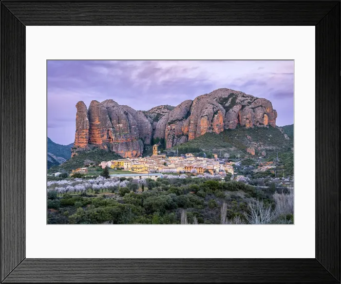 Framed Print : Scenic view of the village with the Mallos de Aguero rock formations behind, Aguero, Huesca, Aragon, Spain Framed Print : Scenic view of the village with the Mallos de Aguero rock formations behind, Aguero, Huesca, Aragon, Spain