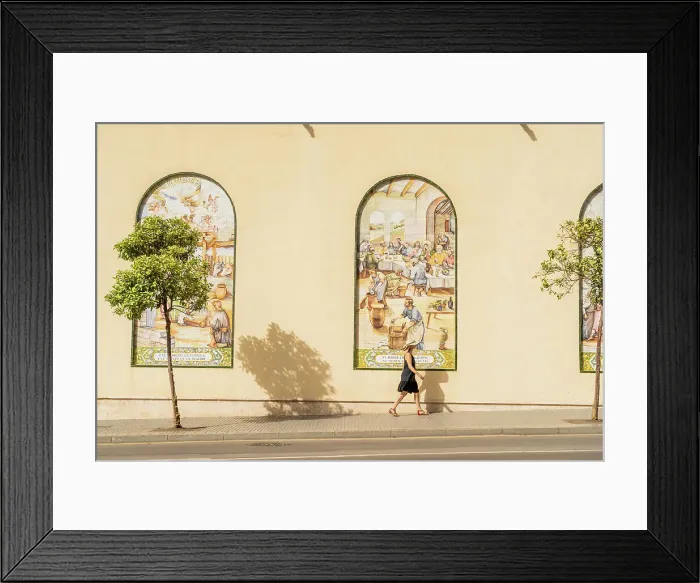 Framed Print : A woman walking past the Museum of the Brotherhood of Hope, Malaga, City, Andalusia, Spain. MR Framed Print : A woman walking past the Museum of the Brotherhood of Hope, Malaga, City, Andalusia, Spain. MR