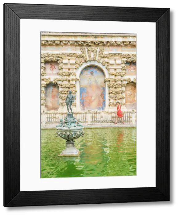 Framed Print : A woman in the Royal Alcazar of Seville, Unesco, Seville, Andalusia, Spain. MR Framed Print : A woman in the Royal Alcazar of Seville, Unesco, Seville, Andalusia, Spain. MR