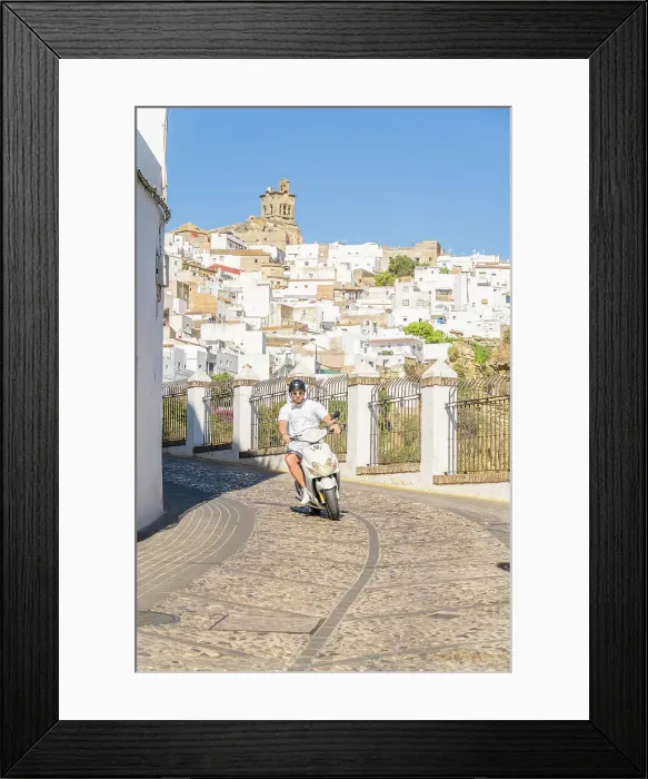 Framed Print : Man riding a scooter, Arcos de la Frontera, Andalusia, Spain Framed Print : Man riding a scooter, Arcos de la Frontera, Andalusia, Spain