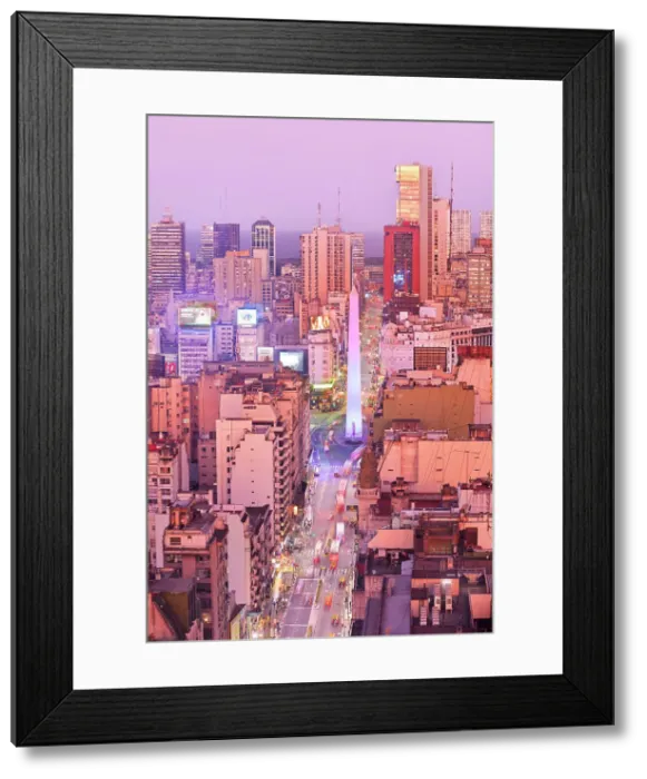 Framed Print : The Obelisk monument illuminated at twilight with La Plata river in the background, San Nicolas, Buenos Aires, Argentina Framed Print : The Obelisk monument illuminated at twilight with La Plata river in the background, San Nicolas, Buenos Aires, Argentina