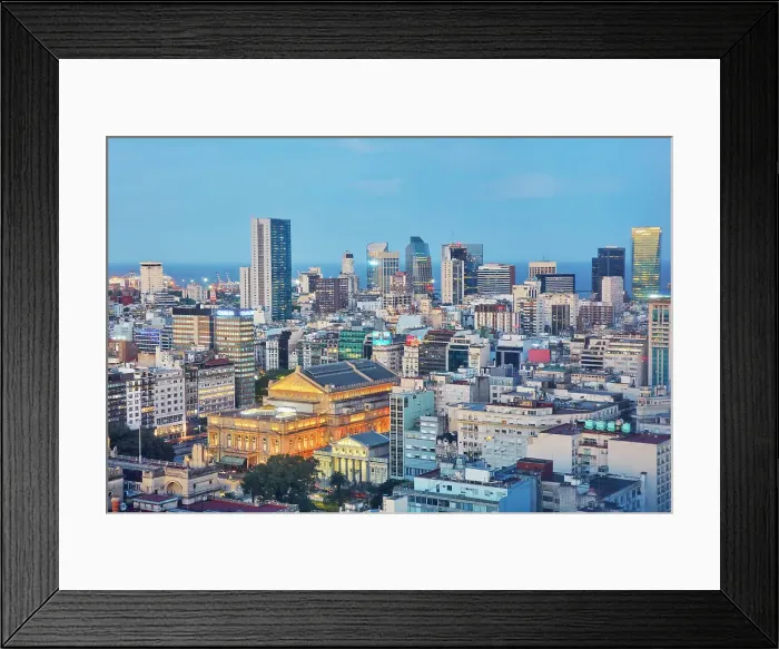 Framed Print : The Colon Theatre Opera House illuminated at night with the skyscrapers of Buenos Aires and La Plata river in the background, Buenos Aires, Argentina Framed Print : The Colon Theatre Opera House illuminated at night with the skyscrapers of Buenos Aires and La Plata river in the background, Buenos Aires, Argentina