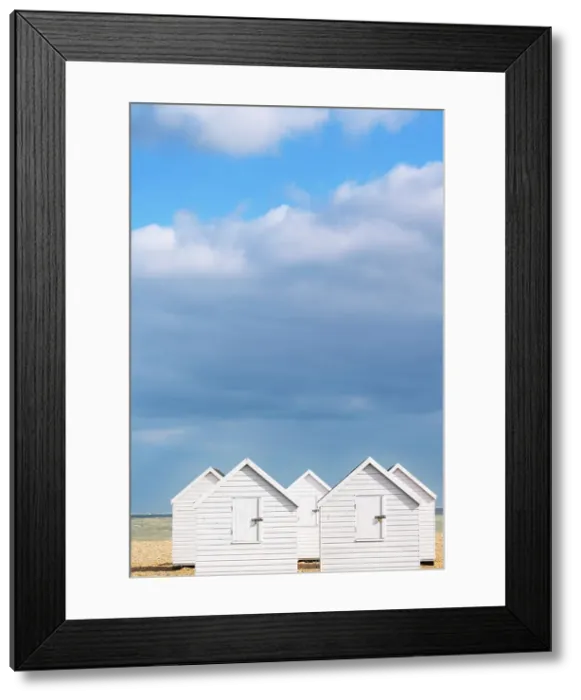 Framed Print : White beach huts ion a beach in Walmer, Kent, England Framed Print : White beach huts ion a beach in Walmer, Kent, England