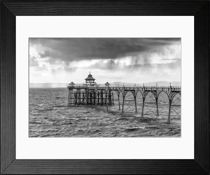 Framed Print : Clevedon Pier, opened in 1869 and one of the earliest surviving examples of a Victorian pier, Clevedon, Somerset, England Framed Print : Clevedon Pier, opened in 1869 and one of the earliest surviving examples of a Victorian pier, Clevedon, Somerset, England