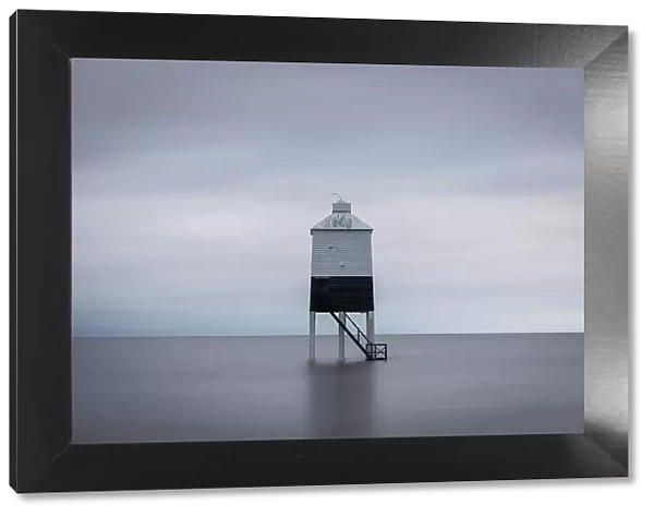 Burrnham's stilted Low Lighthouse at high tide, Burnham on Sea, Somerset, England. Winter (February) 2023